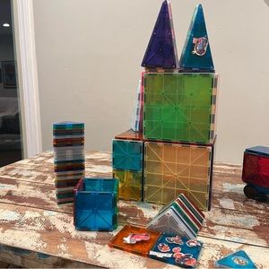 Magna Tiles Classic-114 tiles and two wheeled bases